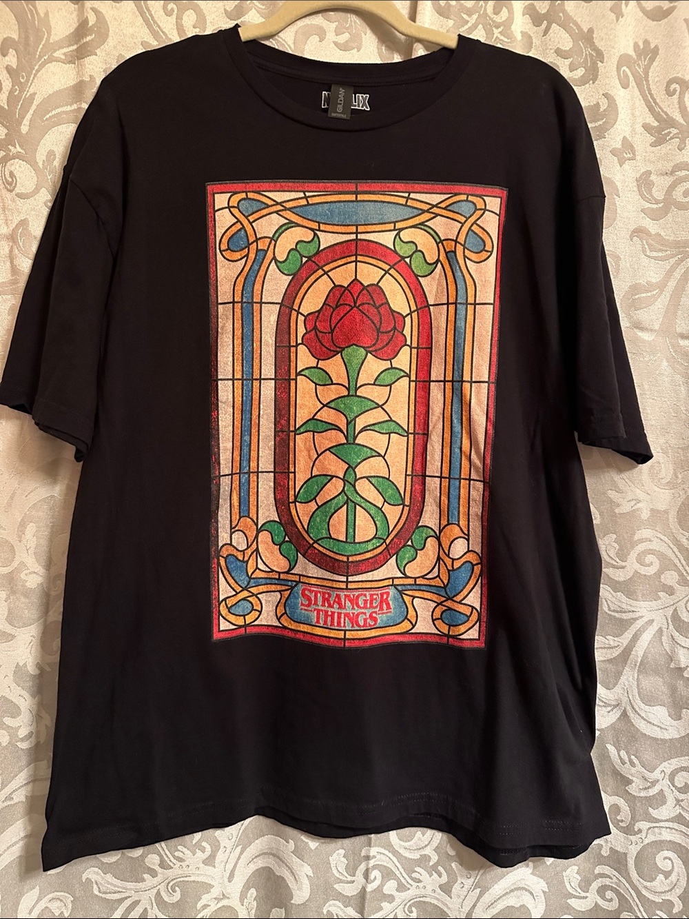 Netflix Black Short-Sleeve Tee with Red Rose Stained-Glass Graphic